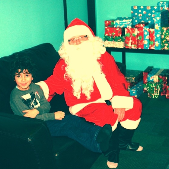 Adam & Santa at my DH's Family Christmas Party. 